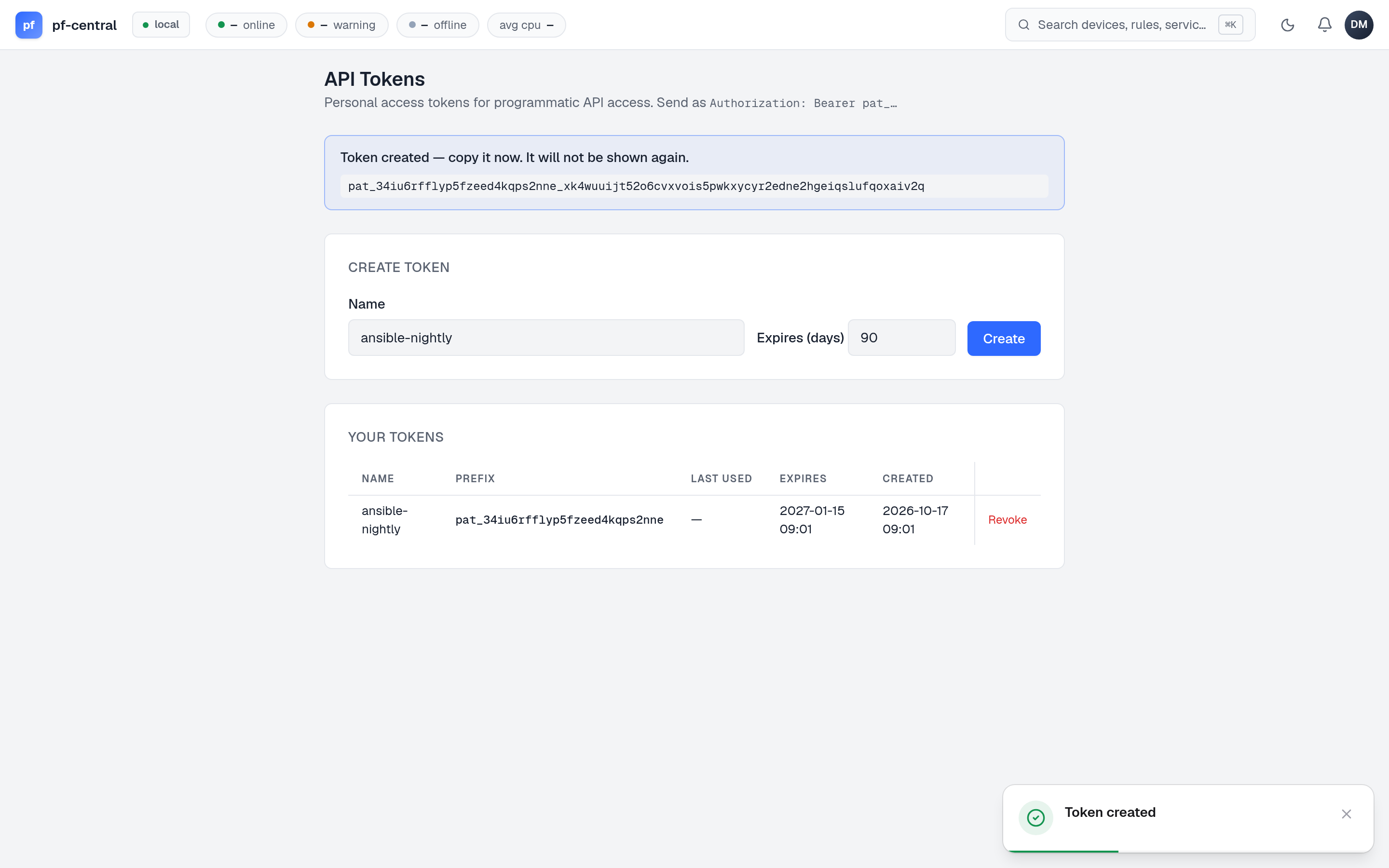API Tokens page showing a newly created token, shown once, and the token list